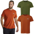 A man in an orange t-shirt walks slightly to the left while two other t-shirts, one green and one orange, are displayed above him against a white background.