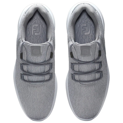 Gray golf shoes sit side by side showcasing a textured upper and a smooth sole with a brand logo on the insole highlighting a casual sporty design intended for comfortable wear.