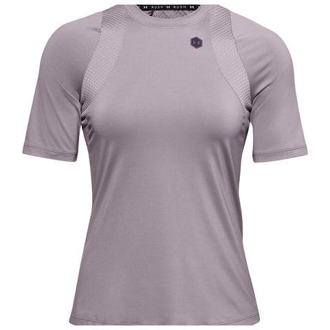 A short-sleeved athletic shirt in a light gray color is displayed. The shirt features textured panels along the shoulders and has a logo on the upper chest area.