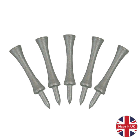 Five gray golf tees are arranged upright with pointed ends facing downwards in a neutral backdrop showing a British flag emblem that reads Made in UK.