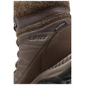 A brown waterproof hiking boot is positioned upright showing its textured leather and felt upper along with branding details and a rugged sole designed for outdoor activities.