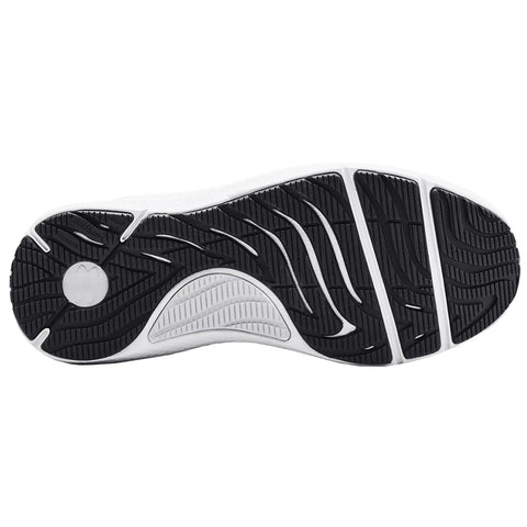 A sneaker sole is displayed with a patterned black rubber surface featuring grooves and ridges designed for traction the sneaker appears to be lightweight and suitable for athletic use