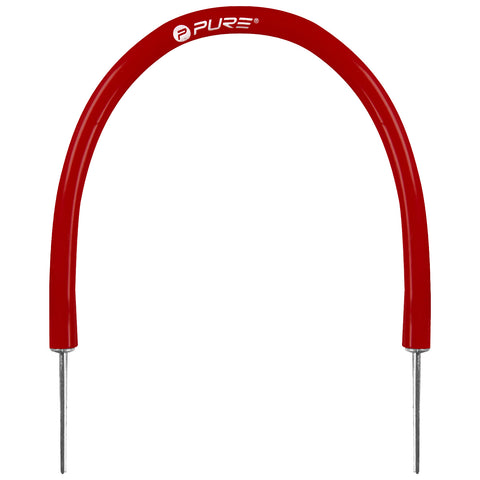 A red curved object with a smooth surface and metal tips is positioned upright against a neutral background suggesting it may be a tool used in outdoor sports or activities.