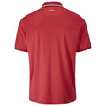 A red polo shirt hangs displayed showcasing its short sleeves and collar with a contrasting stripe at the back near the neck featuring the brand name Farah on it.