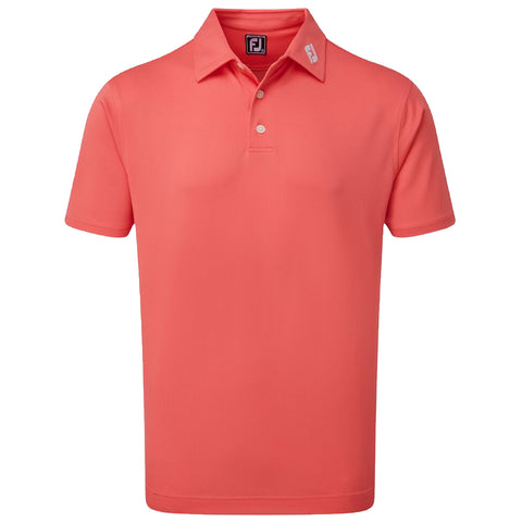 A coral golf polo shirt is displayed centered against a neutral background showcasing a classic collar and three buttons highlighting its casual and athletic style.