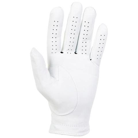 A white golf glove rests with fingers extended showcasing a smooth surface and perforations for breathability designed to enhance grip and comfort during play on a golf course.