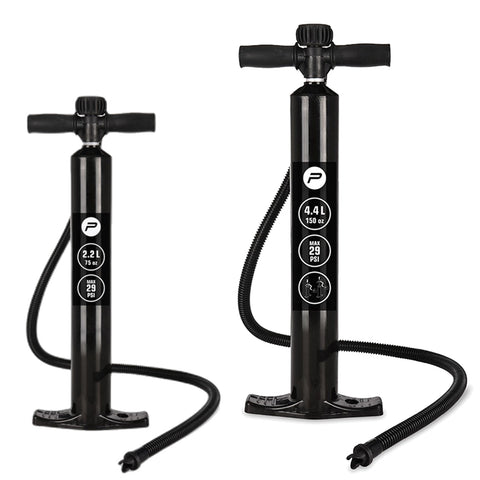 Two black manual air pumps stand side by side with a hose attached to each. The left pump has a capacity of 2.2 liters and the right one 4.4 liters with a maximum pressure of 29 PSI.