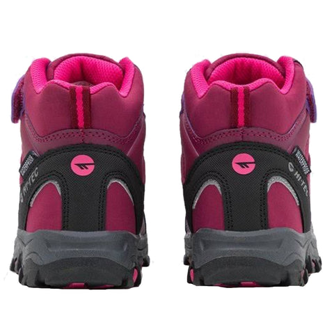 Two hiking boots are positioned upright showcasing their pink and black design with a textured sole highlighting durability and support intended for outdoor activities against a plain white background.