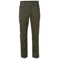 Green outdoor pants are displayed upright featuring a button closure and multiple zippered pockets designed for functionality in active environments such as hiking or camping.