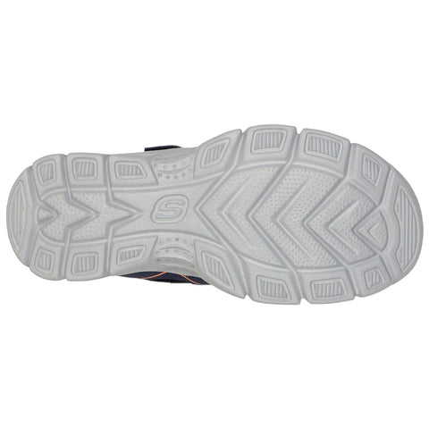 A running shoe sole features a textured white bottom with a zigzag pattern providing traction and flexibility designed for movement on various surfaces ideal for athletic activities.