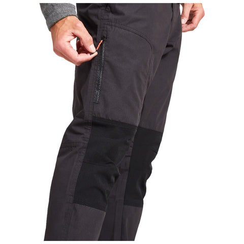 Black pants are shown with a close-up view highlighting the waistband and side pockets featuring the brand name Craghoppers subtly embroidered on the fabric in a simple font.