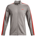 A gray athletic jacket with red stripes down the sleeves has a zip front and a collar designed for sports use and casual wear. Ideal for outdoor activities or workouts.