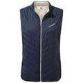 A dark blue quilted sleeveless vest is displayed upright with a front zipper and logo on the left side showcasing its insulated design for warmth and outdoor use.