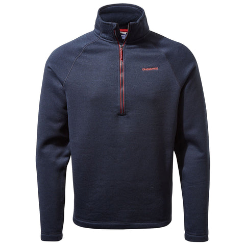 A navy fleece pullover is displayed with a half zipper at the neck featuring a red accent. It is designed for warmth and comfort in casual or outdoor settings.