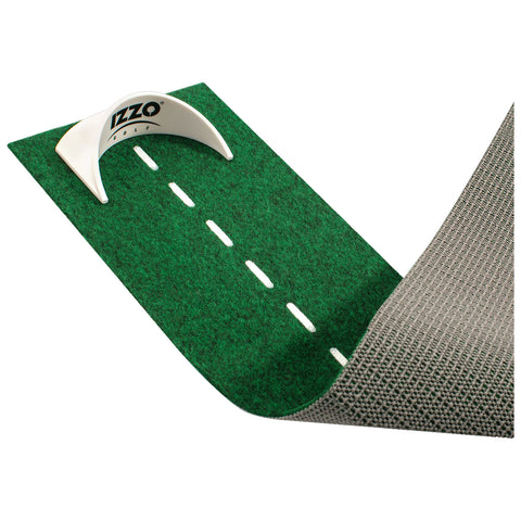 A green putting mat features a white alignment guide and a gray textured edge designed for indoor golf practice in a home or office environment.