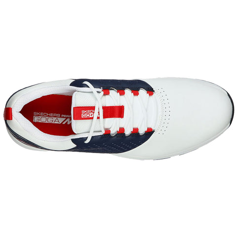 Sport shoe with white and navy design laces threaded through eyelets on the upper near a red branded tag displayed against a plain background showcasing its sleek form and modern style.