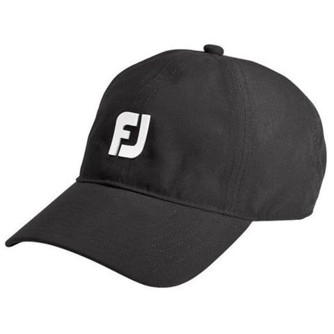 A black cap is displayed featuring a white logo on the front panel the cap stands on a flat surface potentially ready to be worn outside in casual or sporty contexts