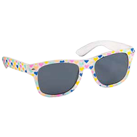 Colorful heart-patterned sunglasses rest on a flat surface with dark lenses and white arms highlighting vibrant designs suitable for casual and playful settings often associated with summer or outdoor activities