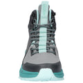 A gray and teal high-top shoe with a padded collar is positioned upright showing its laces and textured surface designed for outdoor activities against a white backdrop.