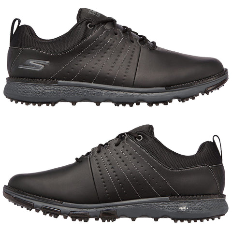 Black golf shoes feature a sleek design with perforations and a textured sole. They are placed against a neutral background, showcasing their style and functionality for the sport.