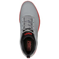 A gray sneaker with a ribbed design and red accents sits upright showing its laces and interior branding for Skechers Golf and Go Golf Pro 3.