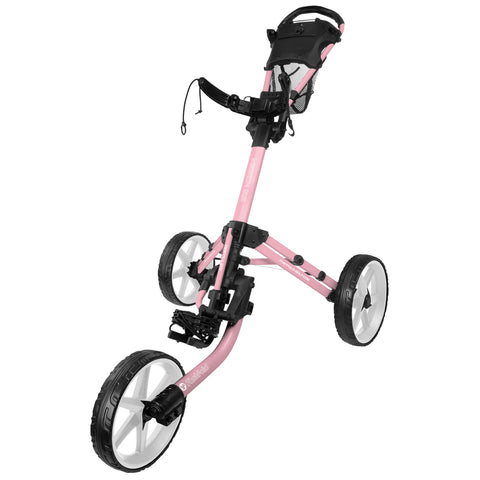 A pink golf push cart stands upright with large white wheels showcasing a handle and mesh storage. It is designed for transporting golf bags on the course.