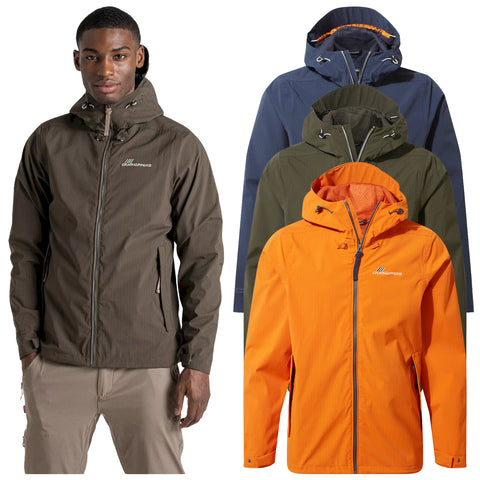 A man wears a brown jacket while three other jackets in orange, dark blue, and green hang behind him showcasing outdoor apparel suitable for various weather conditions.