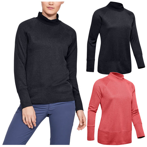 Under Armour Ladies Storm Sweaterfleece Top Three long-sleeve mock neck sweatshirts are displayed in black and coral colors. One model is wearing a black sweatshirt while standing, showcasing a casual and stylish outfit suitable for cooler weather.