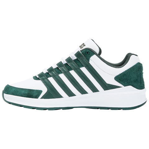 A sneaker features a green and white color scheme with six prominent green stripes and a cushioned sole designed for comfort during physical activities. The setting is neutral and plain.