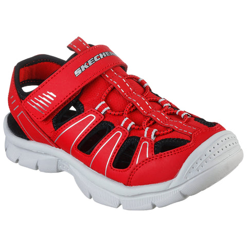 A red and black athletic sandal features a strap and elastic laces. It is designed for active use, likely in warm outdoor environments, providing ventilation and support.