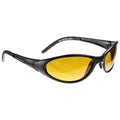 Sunglasses with a black frame and yellow-tinted lenses are positioned at an angle showcasing their sleek design intended for sun protection in bright outdoor environments.