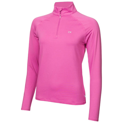 A pink long-sleeve shirt with a quarter zip stands upright against a neutral background showcasing its smooth fabric and simple design featuring a small logo in the center.