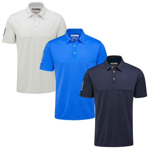 Stuburt Mens Active-Tech Goldcrest Polo SBTS1290 Three polo shirts are displayed side by side. The white shirt features a solid design. The blue shirt has a color-blocked style. The navy shirt is similar to the blue shirt, all set against a plain background.