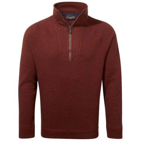 A red pullover sweater is displayed featuring a quarter-zip collar and ribbed texture the sweater is designed for warmth and casual wear