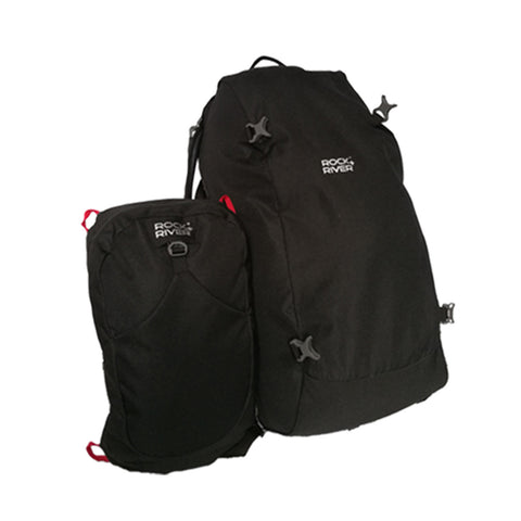 A large black backpack stands alongside a smaller black backpack both are made of fabric featuring straps and buckles with branded logos on the front.