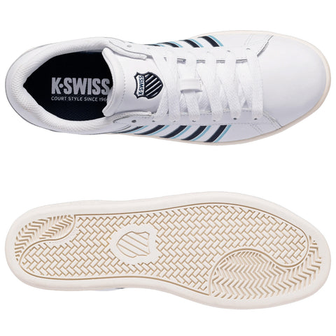 A white sneaker with blue and black stripes is displayed from above alongside its sole. The shoe features a rounded toe and a logo on the tongue, designed for casual or court use.