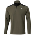 A long-sleeve athletic shirt in olive green features a quarter zip and black shoulder accents designed for active wear in sports or casual settings.