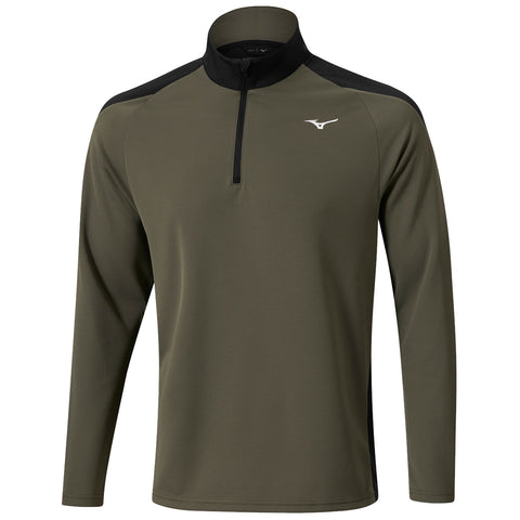 A long-sleeve athletic shirt in olive green features a quarter zip and black shoulder accents designed for active wear in sports or casual settings.