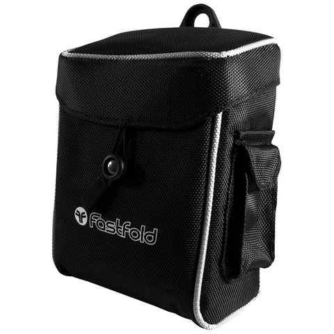 A small black fabric bag with a flap closure is positioned upright. It features a front snap button and a side handle. The brand logo Fastfold is visible on the front.