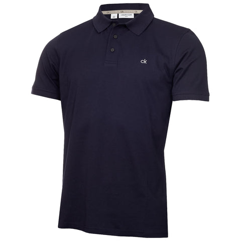 A dark navy polo shirt hangs upright showcasing a three-button placket and short sleeves accentuated by a small embroidered logo on the chest it is displayed against a neutral background