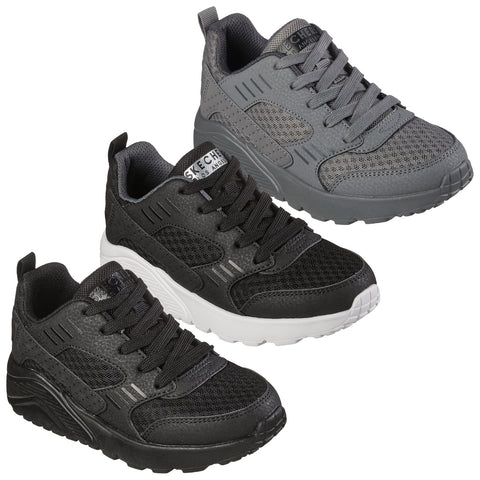 Three pairs of sneakers are displayed side by side showcasing a gray pair a black pair and a black and white pair each featuring a mesh design and lace-up closure.