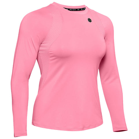 A bright pink long-sleeve athletic shirt is displayed with a fitted design featuring mesh panels on the sides emphasizing moisture-wicking and flexible movement suitable for workouts or outdoor activities.