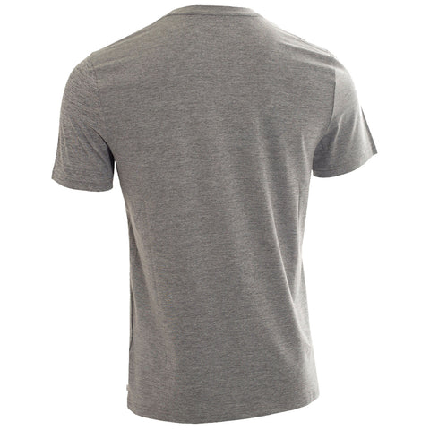 A gray short-sleeved t-shirt is displayed from the back showcasing its simple design and soft fabric in an indoor setting without any visible logos or patterns.