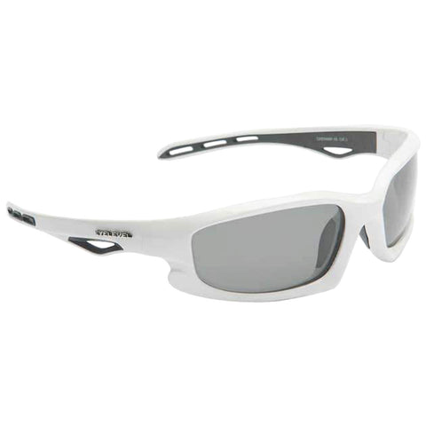 White sunglasses with gray lenses are positioned at an angle displaying their sporty design and ventilation features suitable for active outdoor use against a neutral background.