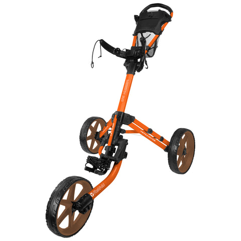 A three-wheeled golf push cart designed for transporting golf bags is positioned upright showcasing its bright orange frame and brown wheels within a plain white background.