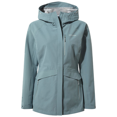 A light blue waterproof jacket hangs vertically with a hood and multiple pockets showcasing a sleek design suitable for outdoor activities or rainy weather.