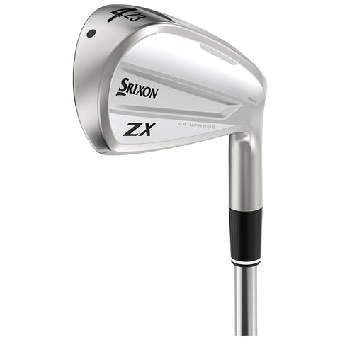 A golf club with a sleek silver head and a black grip stands upright showcasing its design and branding while indicating readiness for a swing in an open golf course setting.