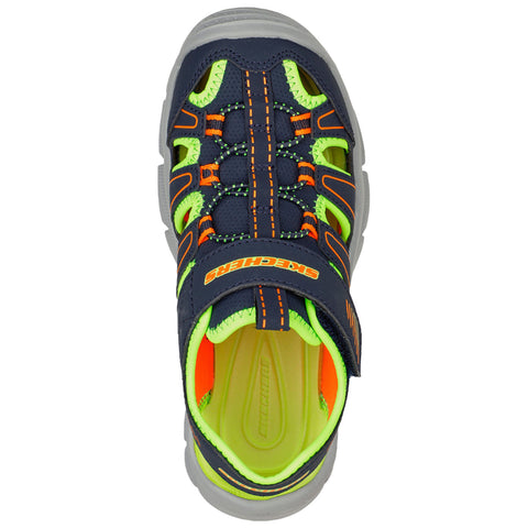 A navy and neon green sneaker features an elastic lace system and a Velcro strap The shoe is designed for active wear and displays a sporty look suitable for children