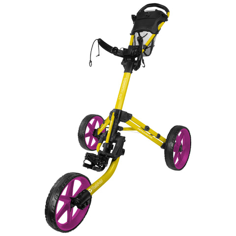 A golf push cart with three wheels features a bright yellow frame and pink wheels. It includes a handle for steering and a storage compartment above for accessories.